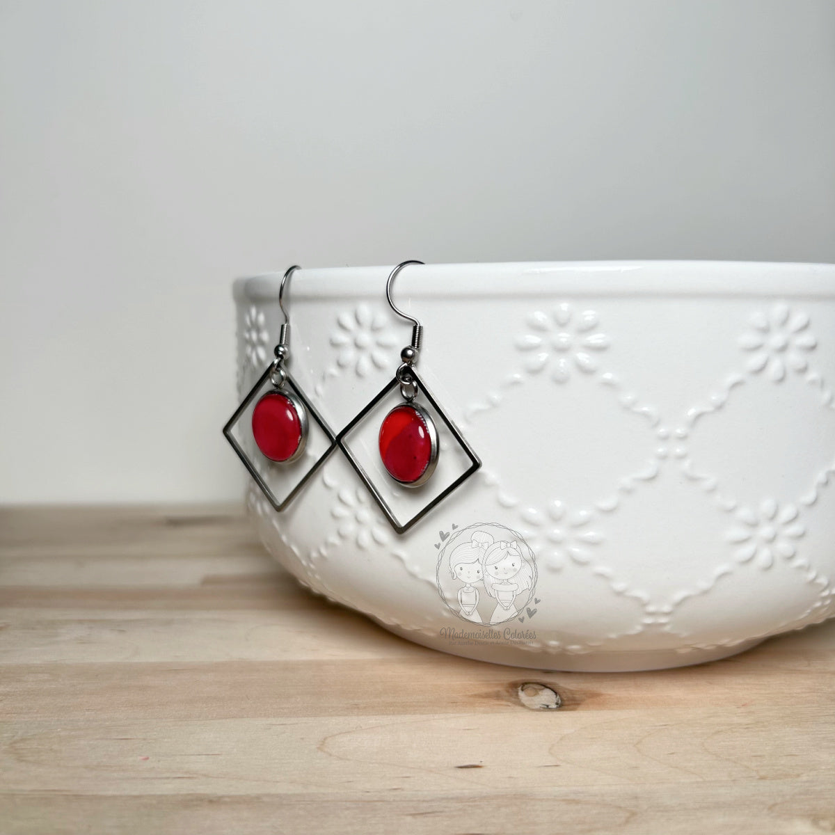 Boucle d'oreille pendante forme géométique
